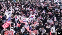 Supporters of impeached South Korean President Yoon Suk Yeol stage a rally to oppose his impeachment near the presidential residence in Seoul, South Korea, Jan. 9, 2025. 