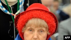 FILE - Eva Mozes Kor, a twin who survived medical experiments at the Nazi Auschwitz death camp, attends ceremonies marking 65 years since the camp was liberated, in Oswiecim, Jan. 27, 2010. 