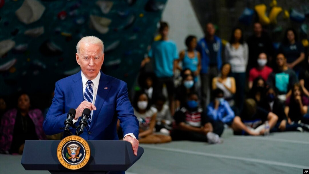 President Joe Biden speaks at Sportrock Climbing Centers, Friday, May 28, 2021, in Alexandria, Va. (AP Photo/Evan Vucci)