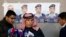 Safi al-Kaseasbeh, center, father of Islamic State captive Jordanian pilot Mu'ath al-Kaseasbeh, stands before a news conference where he asked Islamic State fighters to pardon and release his son, in Amman, Feb. 1, 2015. 