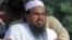 Hafiz Saeed, head of Jamaat-ud-Dawa charity and founder of Lashkar-e-Taiba, attends an anti-U.S. rally in Peshawar, Pakistan, October 1, 2012. 