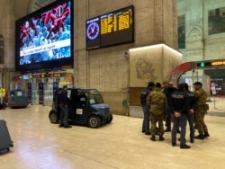 Military and policemen are seen inside Milan's main train station as Italian authorities prepare to lock down Lombardy to prevent the spread of the highly infectious coronavirus in Milan, March 7, 2020.