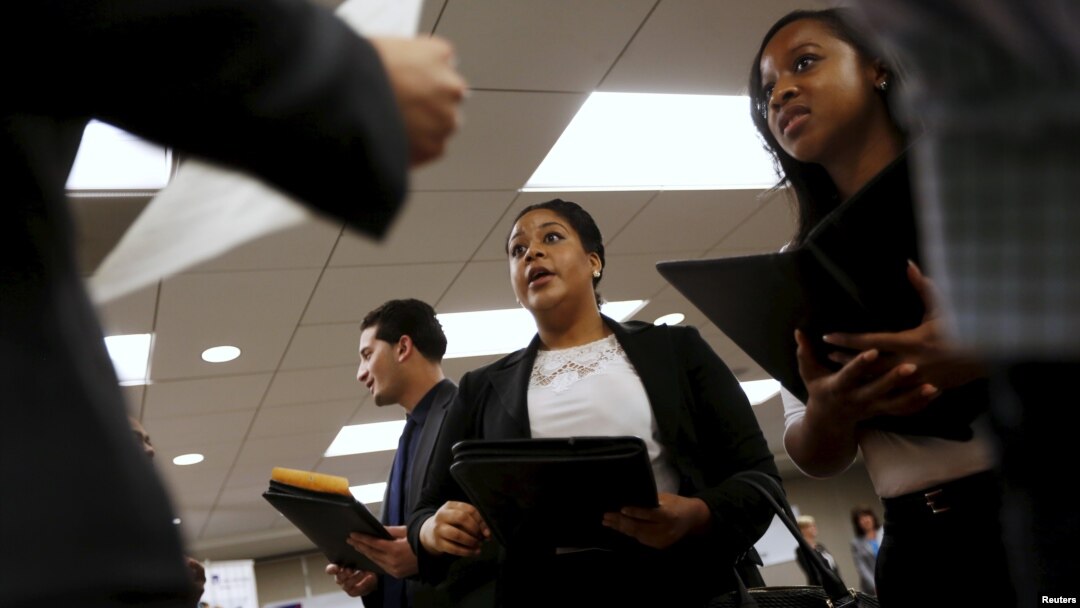 Job seekers listen to prospective employers during a job hiring event for marketing, sales and retail positions in San Francisco, California, June 4, 2015.