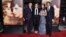 From left, Eddie Redmayne, Amber Heard, Alicia Vikander and Tom Hooper arrive at the premiere of "The Danish Girl" at Regency Village Theatre, Nov. 21, 2015, in Los Angeles, California.