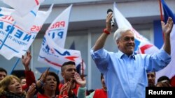 FILE - Chilean conservative presidential candidate Sebastian Pinera delivers a speech during a campaign rally in Santiago, Chile, Sept. 20, 2017.