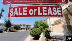 A home is seen for sale in Gilbert, Arizona, July 30, 2013.