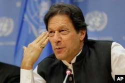FILE - Imran Khan, Prime Minister of Pakistan, speaks to reporters during a news conference at United Nations headquarters, Sept. 24, 2019.