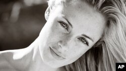 FILE - An undated portfolio photo supplied by Ice Model Management in Johannesburg of Oscar Pistorius' late girlfriend, Reeva Steenkamp, during a photo shoot.