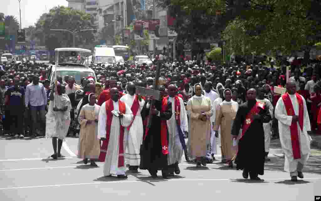 Postal clerk Pamela Bentley shovels snow in front of the U.S. Post Office in Grafton, New York.