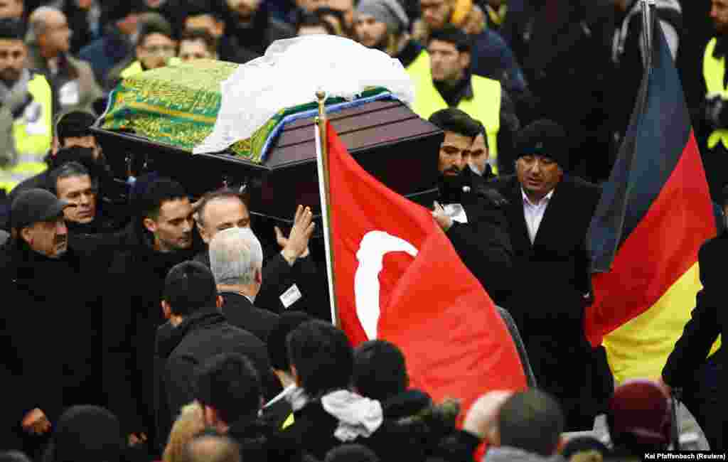 Mourners carry the coffin of&nbsp;Tugce Albayrak outside a mosque during a memorial service for late student in Waechtersbach, Dec. 3, 2014.