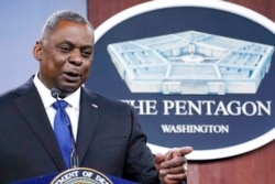 FILE - Defense Secretary Lloyd Austin speaks during a briefing at the Pentagon in Washington, May 6, 2021.