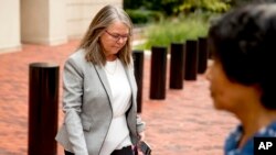Tax preparer Cynthia Laporta leaves the Alexandria Federal Courthouse in, Alexandria, Va., Aug. 3, 2018, on day four of Paul Manafort's tax evasion and bank fraud trial. 