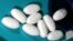 FILE - One kind of statin used for lowering blood cholesterol, 40 milligram tablets of Lipitor, are shown in Glen Rock, N.J., Nov. 15, 2005. 