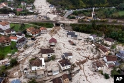 FILE - An aerial view shows the area destroyed by a landslide in Donja Jablanica, Bosnia, Oct. 5, 2024.