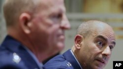 U.S.Air Forces Central Commander in Qatar, Lt. Gen. Jeffrey L. Harrigian, right, addresses a joint press conference with Vice Chief of Staff of the Air Force, General Stephen Wilson, in Dubai, United Arab Emirates, Friday, Nov. 10, 2017.