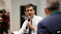 FILE - Democratic presidential candidate South Bend, Ind., Mayor Pete Buttigieg speaks during the Iowa Farmers Union Presidential Forum, Dec. 6, 2019, in Grinnell, Iowa.