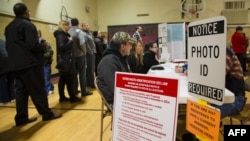 Voters take to the polls in Wauwatosa, Wis., April 5, 2016. Republicans and Democrats both cast their votes in Tuesday's presidential primaries. 