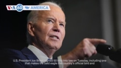 VOA60 America - President Biden signs 50 bills into law