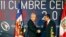 Chile's President Sebastian Pinera (L) and his Peruvian counterpart Ollanta Humala shake hands during a joint news conference at the Community of Latin American and Caribbean States (CELAC) summit in Havana, Jan. 29, 2014.
