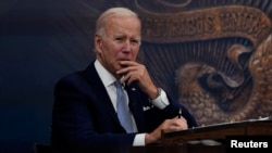 U.S. President Joe Biden receives an update on economic conditions at the White House