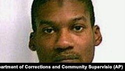 FILE- Emanuel Lutchman, of Rochester, New York, was sentenced Thursday to 20 years in prison and 50 years of supervised release on terrorism charges.