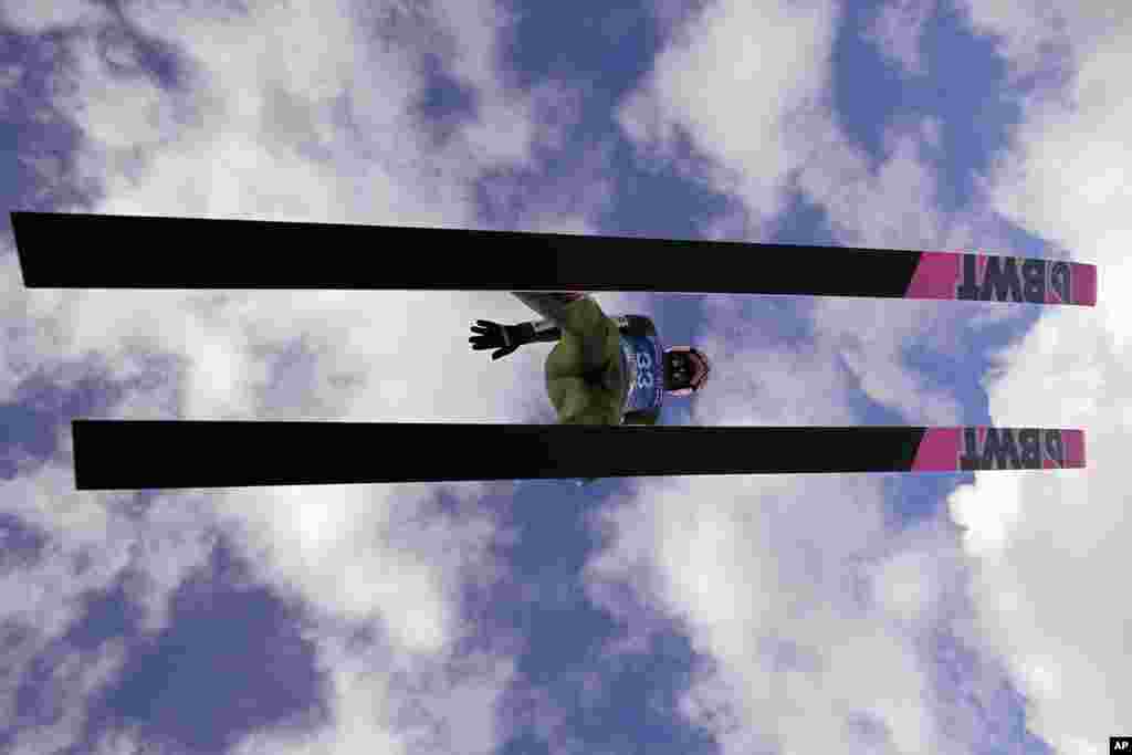 Dawid Kubacki of Poland soars through the air during training at the third stage of the 73rd Four Hills ski jumping tournament in Innsbruck, Austria.