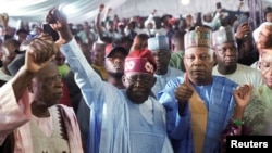 Bola Ahmed Tinubu reacts after he was declared winner in Nigeria's presidential election at the Party's campaign headquarters, in Abuja, Nigeria March 1, 2023. 