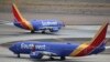 ARCHIVO - Aviones de Southwest Airlines son vistos en el Aeropuerto Internacional Phoenix Sky Harbor en Phoenix, Arizona, 17 de julio de 2019.