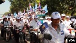 About 10,000 supporters of the opposition rallied in the capital, marching from Freedom Park to sites around the city. From the backs of trucks, people chanted, “Change! Change!”
