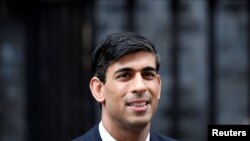 FILE - Britain's Chancellor of the Exchequer Rishi Sunak, pictured in London, Feb. 13, 2020, is expected to unveil plans for an Economic Crime Levy to generate cash for new technology for law enforcement and to hire more financial investigators.