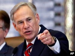 FILE - Texas Gov. Greg Abbott speaks in the House Chamber in Austin, Texas, Feb. 5, 2019.