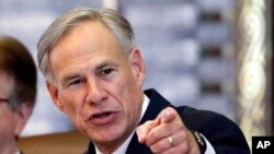 FILE - Texas Gov. Greg Abbott speaks in the House Chamber in Austin, Texas, Feb. 5, 2019.