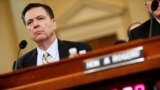 FILE: FBI Director James Comey testifies before the House Intelligence Committee hearing into alleged Russian meddling in the 2016 U.S. election, on Capitol Hill in Washington.