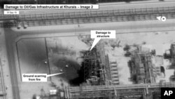 This image provided on Sept. 15, 2019, by the U.S. government and DigitalGlobe and annotated by the source, shows damage to the infrastructure at Saudi Aramco's Kuirais oil field in Buqyaq, Saudi Arabia. 