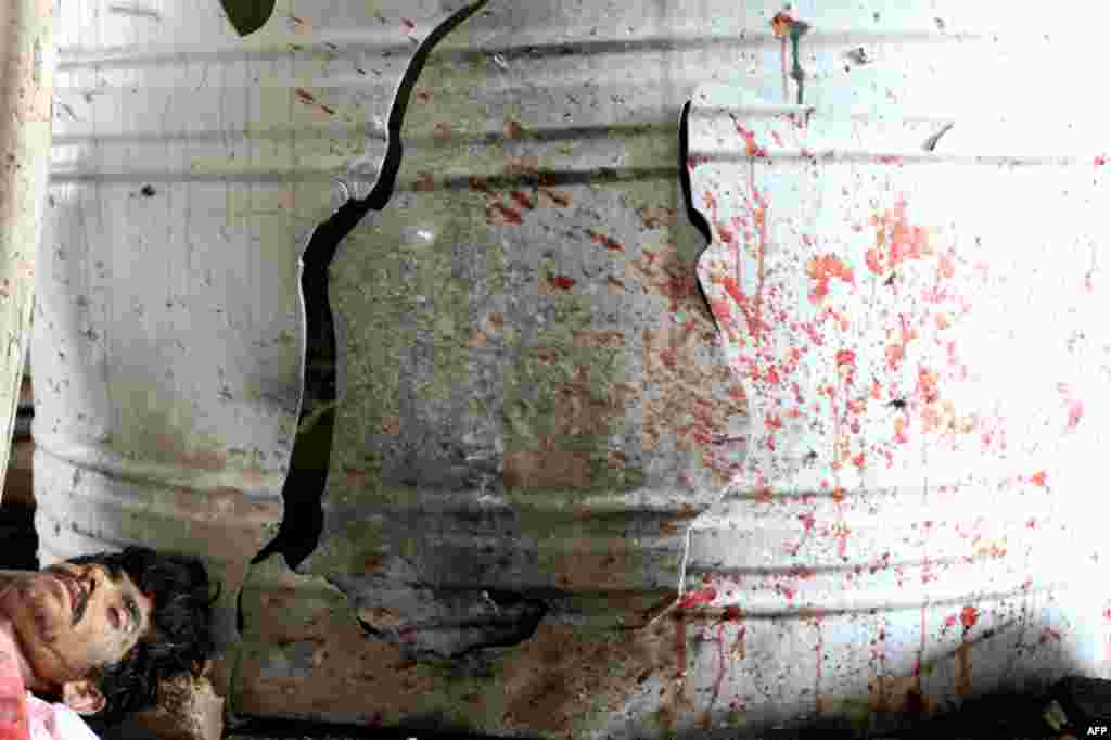A Taliban insurgent after he was killed inside a building in Kabul April 16, 2012. (Reuters)