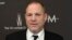 FILE - Harvey Weinstein arrives at The Weinstein Company and Netflix Golden Globes afterparty in Beverly Hills, California, Jan. 8, 2017. 
