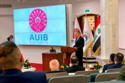 Matthew Tueller, U.S. Ambassador to Iraq, speaks during the opening ceremony of the American University in Baghdad, Iraq, Feb. 14, 2021.