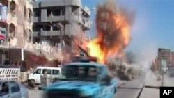 Image showing the moment that a bomb detonates on a street in Kirkuk, Iraq, February 9, 2011