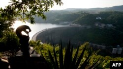 FILE - A general view of the the Kariba Dam wall between Zimbabwe and Zambia, Feb. 19, 2015