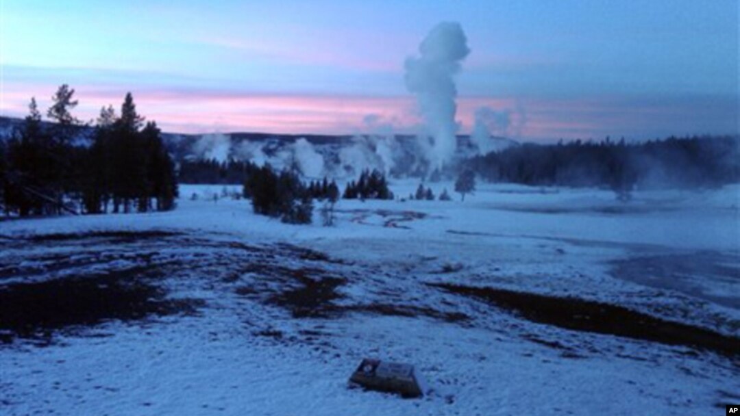 The Upper Geyser Basin at sunset in Yellowstone National Park, which extends across three western states: Wyoming, Montana and Idaho