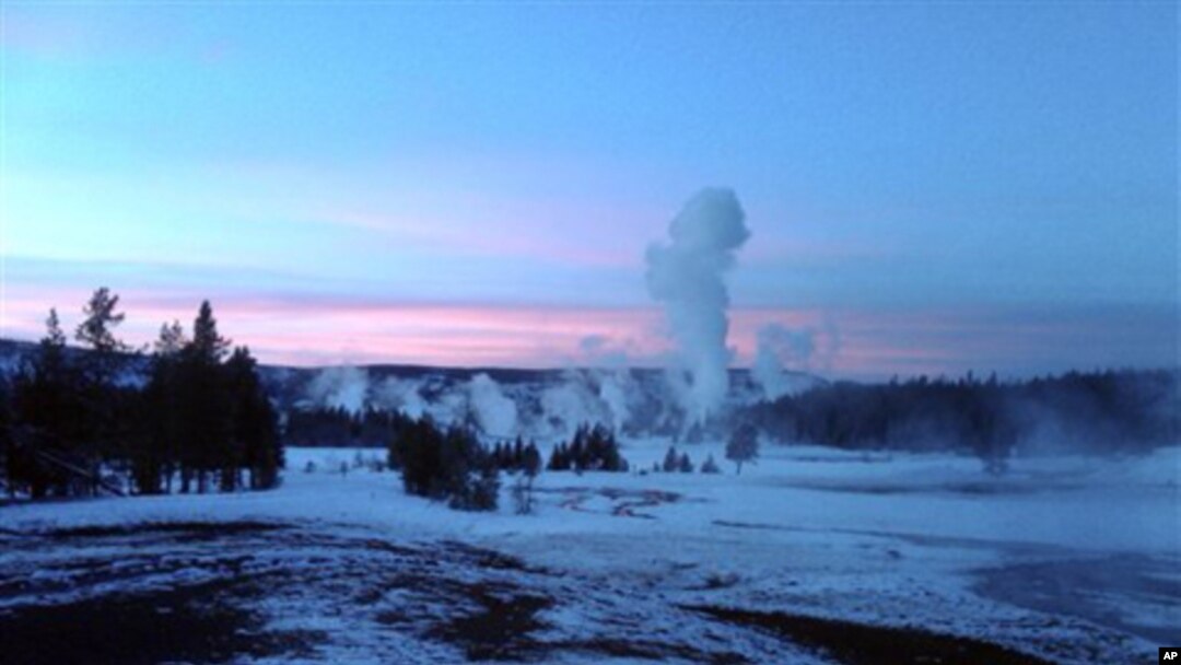 The Upper Geyser Basin at sunset in Yellowstone National Park, which extends across three western states: Wyoming, Montana and Idaho