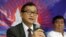 Exiled Cambodian opposition leader Sam Rainsy, left, talks about the opposition's plans for 2013 elections in Cambodia on Sept. 10, 2012, in San Juan, Philippines. 