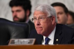 Senate Commerce, Science, and Transportation Committee Chairman Sen. Roger Wicker, R-Miss., asks a question during a hearing on Capitol Hill in Washington, Feb. 5, 2020.