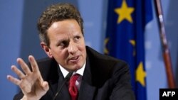 U.S. Treasury Secretary Timothy Geithner briefs the media during a news conference with German Finance Minister Wolfgang Schaeuble after a meeting at the finance ministry in Berlin, Tuesday, Dec. 6, 2011.