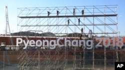 FILE - The Pyeongchang Olympic Stadium is seen under construction in Pyeongchang, South Korea, Oct. 30, 2017. 