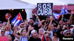 People rally in solidarity with protesters in Cuba, in Little Havana neighborhood in Miami, Florida, July 12, 2021. 