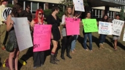 A protest last week in Topeka, Kansas, where investigations of domestic abuse cases have been threatened over budget cuts