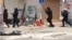 This image provided by an activist who requested to remain unnamed, shows Bahraini security forces during a raid on a sit-in demonstration, in Diraz, Bahrain, May 23, 2017.