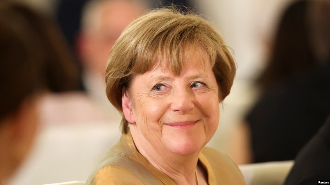 FILE - Former German Chancellor Angela Merkel attends Bellevue Palace for a state banquet in Berlin, Germany, March 29, 2023. 