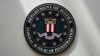 FILE - An FBI seal is displayed on a wall in Omaha, Nebraska, Aug. 10, 2022.